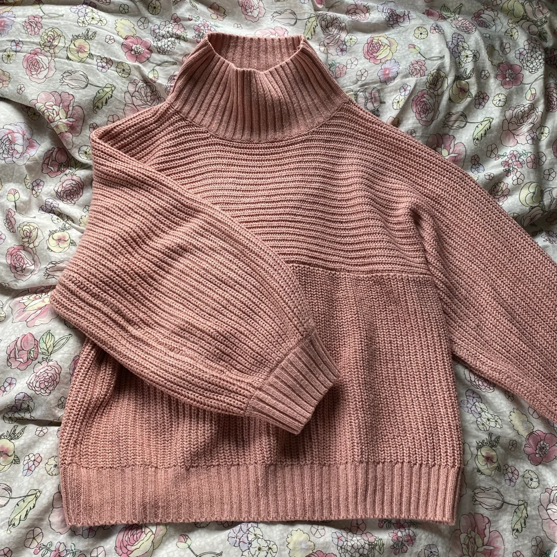 Stickad tröja rosa
