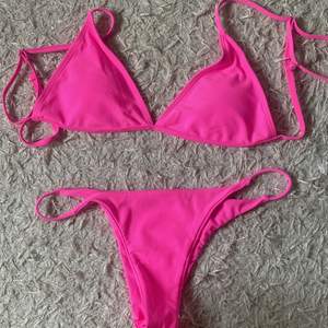 Säljer en oanvänd rosa bikini i storlek L