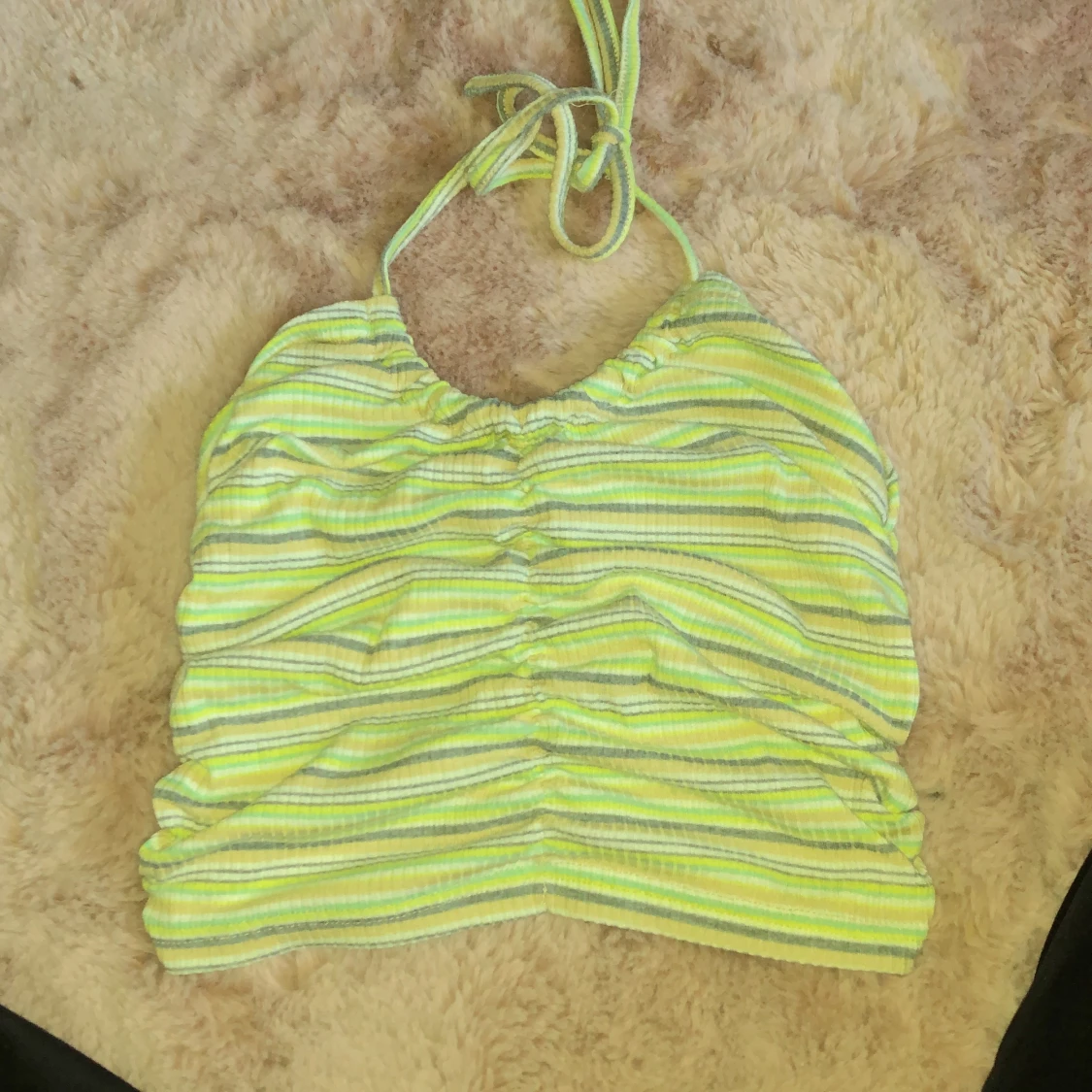 Grön tröja utan ärmar