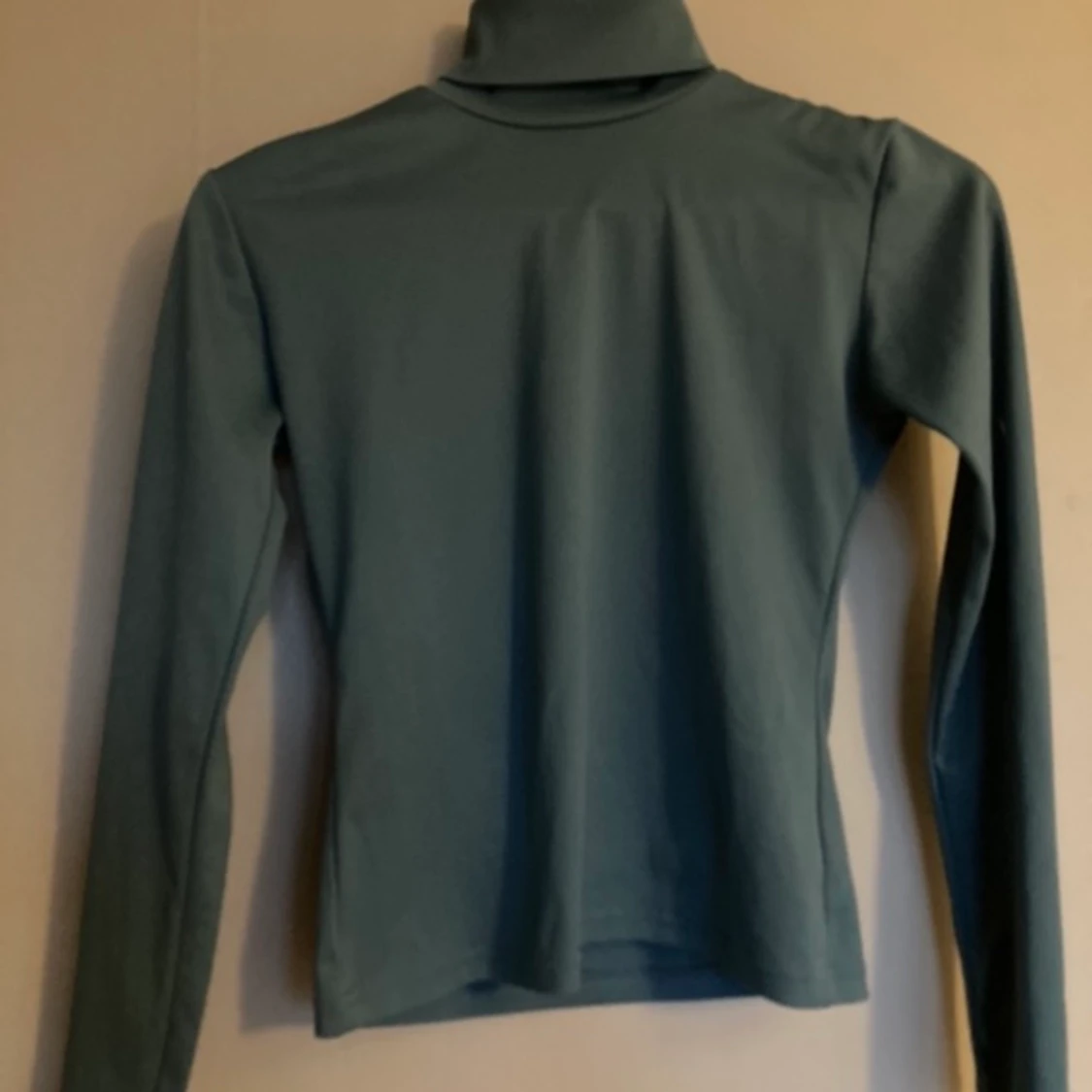 Turkos tröja med krage 