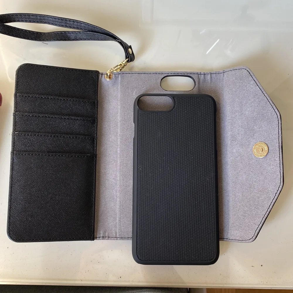 Mobil-och plånbokskal från ideal of Sweden för iPhone 8 plus. Helt oanvänt. Övrigt.