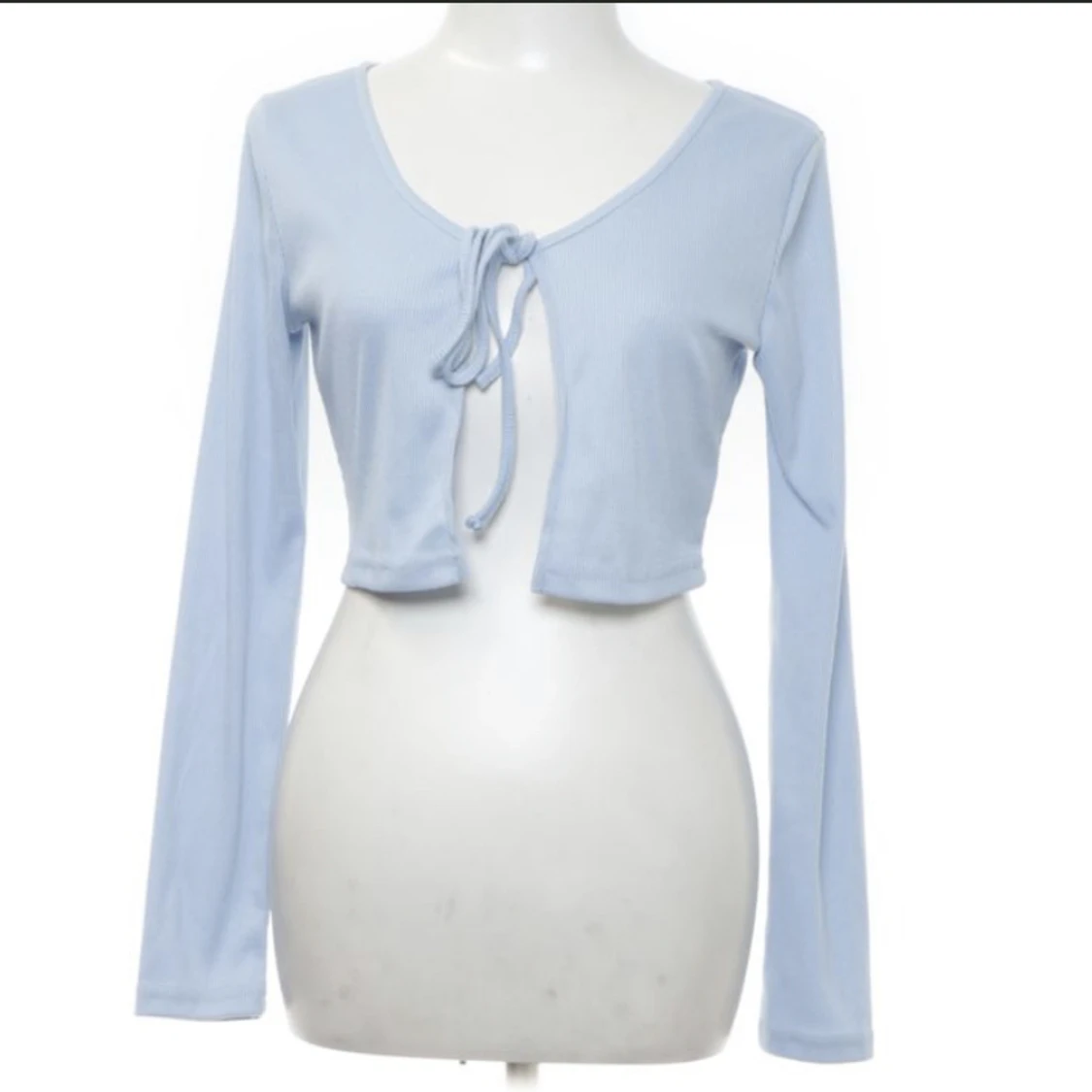 Tunn blå sommarkofta