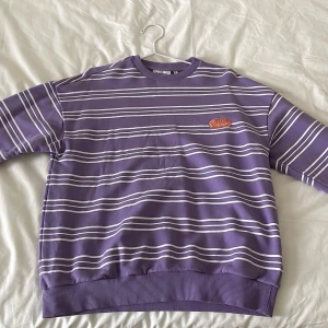 Multiverse Junkyard Sweatshirt - Purple striped Junkyard hoodie worn only twice and is 1 year old. Perfect condition and durable material. Only reason I am selling is because it is a size small.