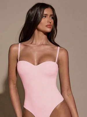 Söta bodys i pastellfärger - Två  bodys i pastellrosa och ljusblått. De hqe ett mjukt och stretchigt material. Helt nya, aldrig använda. Har i både xs och s i båda färgerna 💕