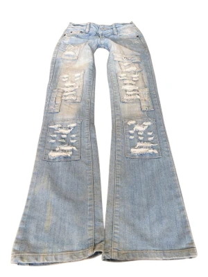 Ljusblå slitna bootcut jeans  - Så snygga jeans!