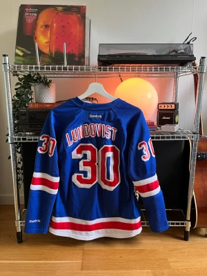 New York Rangers Henrik Lundqvist 30 Women’s Reebok - ✅ Good condition, no signs of wear  📏 Size L (small in size)  🧵 Material: 100% Cotton  📦 Fast delivery  🦧 Stickers are included with every purchase  • If you have any questions, feel free to send a private message :)    #reebok #newyork #y2k #rangers #Vintage #lundqvist #NHL #Hockey #streetwear #skater #opium #y2kvintage #clean #collage #hiphop #y2kfashion #oldschool #pinterest #surfer #umbro #skateboard #streetfashion #00s #90s #80s #thrift #workwear #fashion #menswear #holidaywear #sportswear 