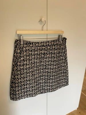 Kjol - Svart/beige kjol, Lindex, 40