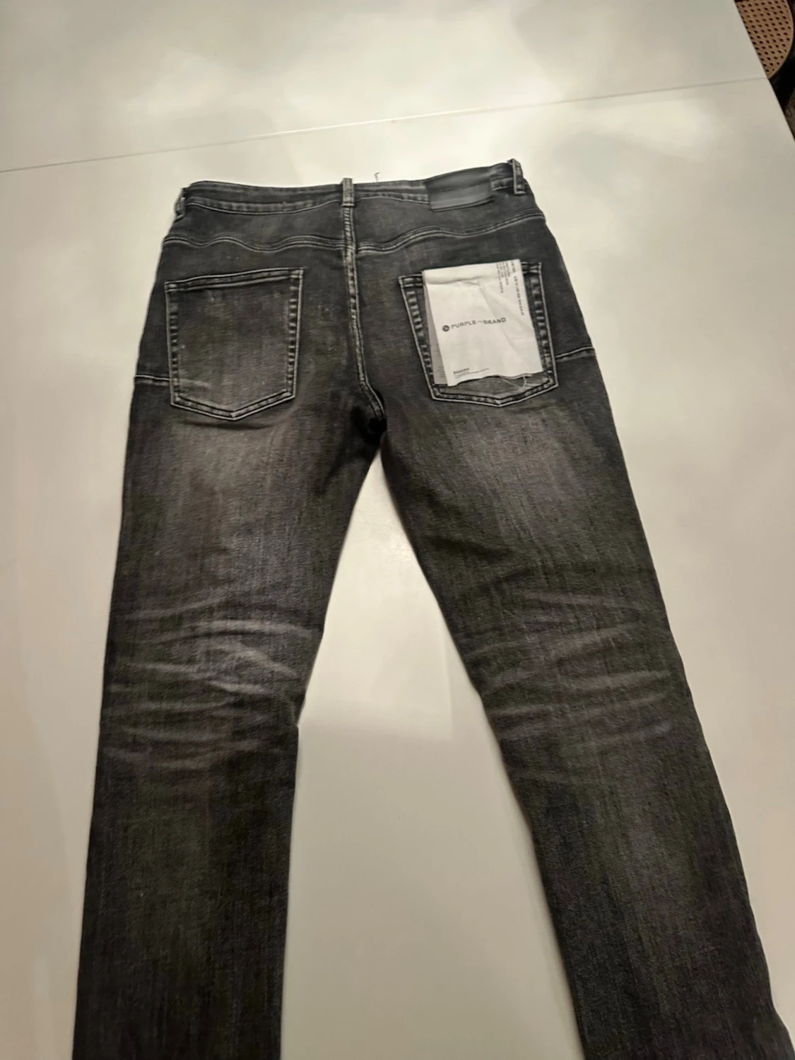 Svarta slitna jeans från Purple - 1