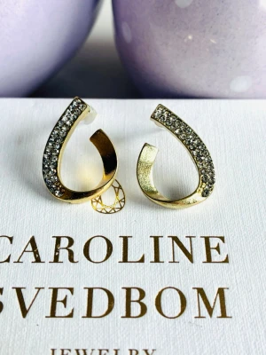 Rhinestone earrings  - Rhinestone earrings in stainless steel, unknown brand. New!