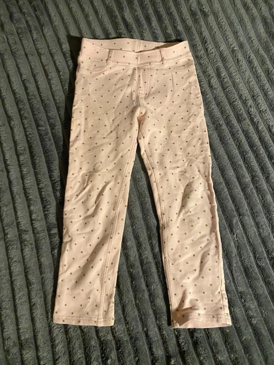 Ljusrosa leggings med guldprickar