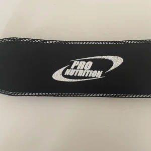 Lyftarbälte - Lyftarbälte som inte kommer till användning längre. Har även ett extra hål.