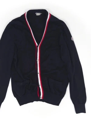 Moncler Knitted Cardigan  - •The Knitted Cardigan has been gently used and is in very good condition •Size: XXL •Color: Navy Blue •Retail price: 8000SEK •Pit to Pit: 54.5cm Length: 67cm