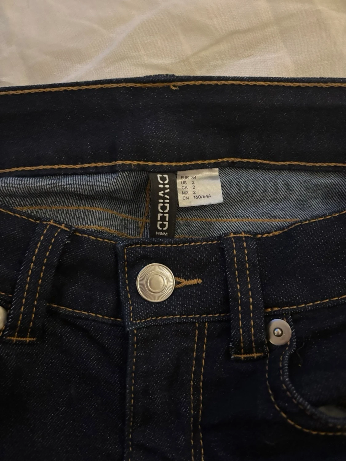 Mörkblå bootcut jeans med kontrastsömmar - 2