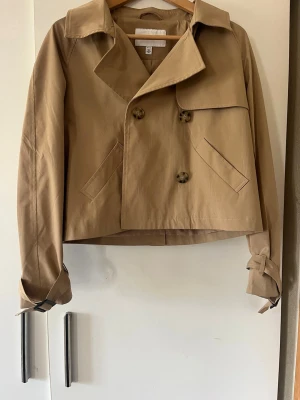 Trenchcoat - Jätte fin trenchcoat från Vila. Storlek 34.