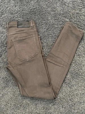 Bruna tiger of Sweden jeans  - Riktigt snygga bruna tiger of Sweden jeans I slim/skinny passform storlek W31 L34