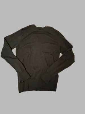 Mörkgrön tröja uniqlo  - Mörkgröna tröja från uniqlo använd 1 gång storlek S