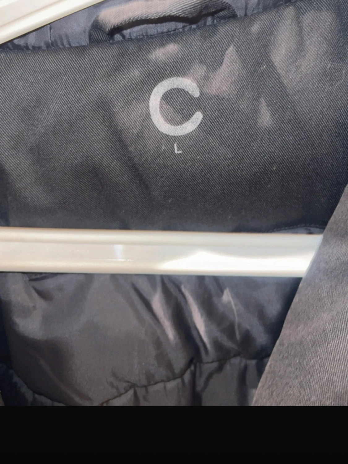Svart pufferjacka med huva - 1