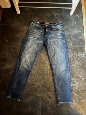 Blåa Jack&Jones jeans  - Still Rena jeans i storlek 34/32