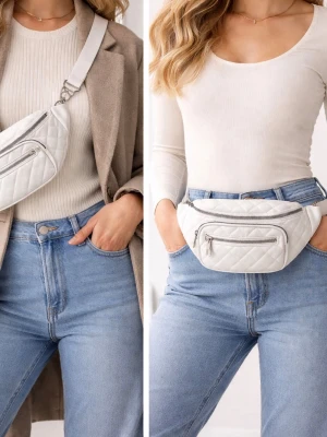 Vit quiltad shoppingväska - Snygg vit shoppingväska i quiltat mönster med justerbar axelrem och silverfärgade dragkedjor. Väskan har ett stort huvudfack och en mindre ytterficka framtill, perfekt för att hålla ordning på dina grejer. Tillverkad i ett läderliknande material för en trendig look.