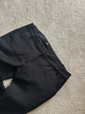 Svarta kostymbyxor Bikbok  - Endast testade 