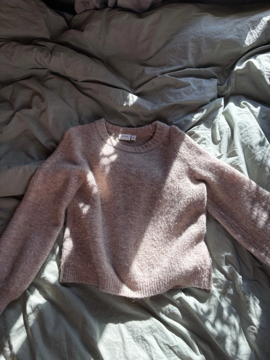 Beige stickad tröja från vila