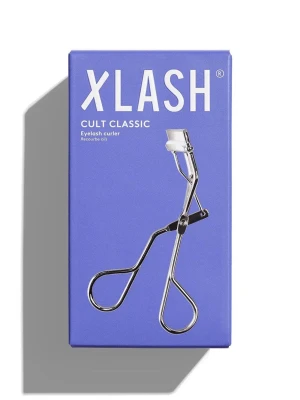 Xlash ögonfransböjare  - En klassisk ögonfransböjare från Xlash i silverfärgad metall med ergonomiskt handtag och mjuk silikonplatta för skonsam böjning av fransarna. Använd enbart ett par få gånger. Nypris: 200 kr