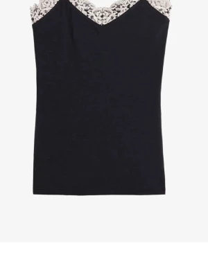 Mörkblå linnetopp från intimissimi - Snygg mlrkblå linnetopp med vit spets upptill och v-ringad hals. Toppen är ärmlös och har en elegant, feminin look som passar perfekt till jeans eller kjol. Materialet känns mjukt och följsamt mot huden.