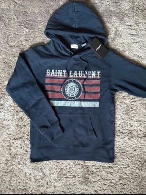 Saint Laurent Hoodie - Go Saint Laurent hoodie, strl M men sitter som S, mycket bra skick