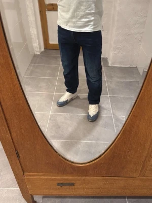 Replay jeans  - Ett par snygga byxor från Replay i storlek W30 L30 i modellen sandot 