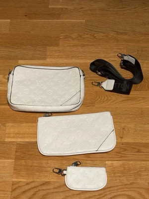 LV TRIO BAG - LV TRIO BAG                                    COLOR: WHITE                                   SIZE: NO SIZE