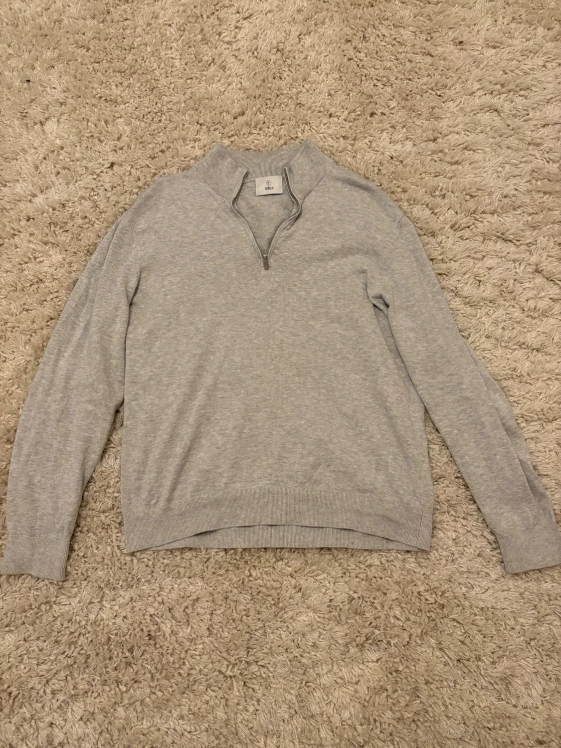 Ljusgrå halvzip tröja från Bläck