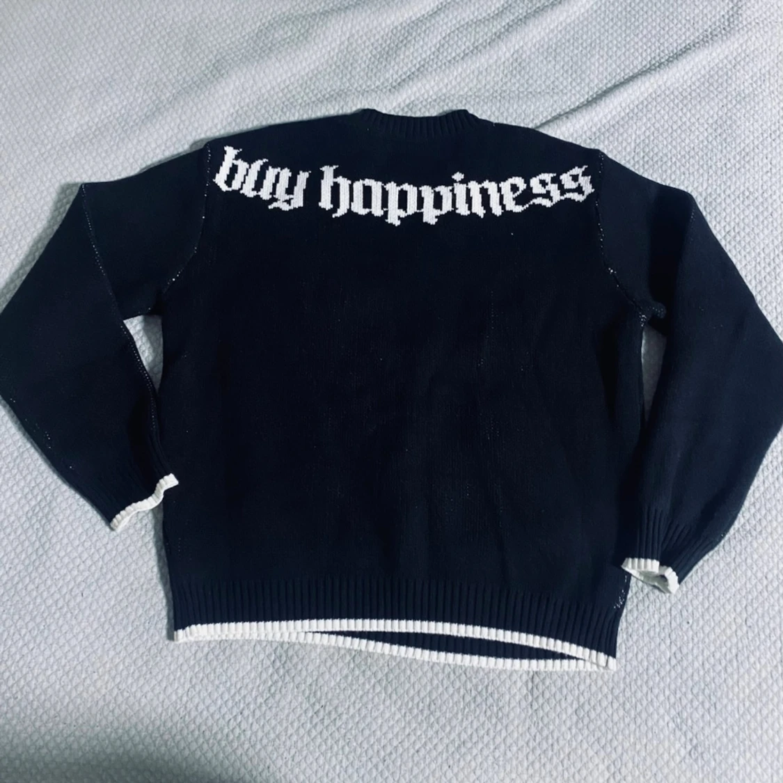 Svart stickad tröja med dollartecken - 2