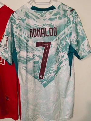 Portugal Ronaldo matchtröja Puma - Portugal fotbollströja med Ronaldo 7 på ryggen. 
