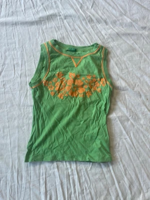 Vintage topp - Bra skick, känns dock använd då materialet har blivit tunnare