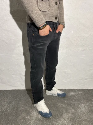 Replay jeans  - Ett par snygga jeans från Replay i storlek W31 L32 i modellen Anbbas hyperflex 