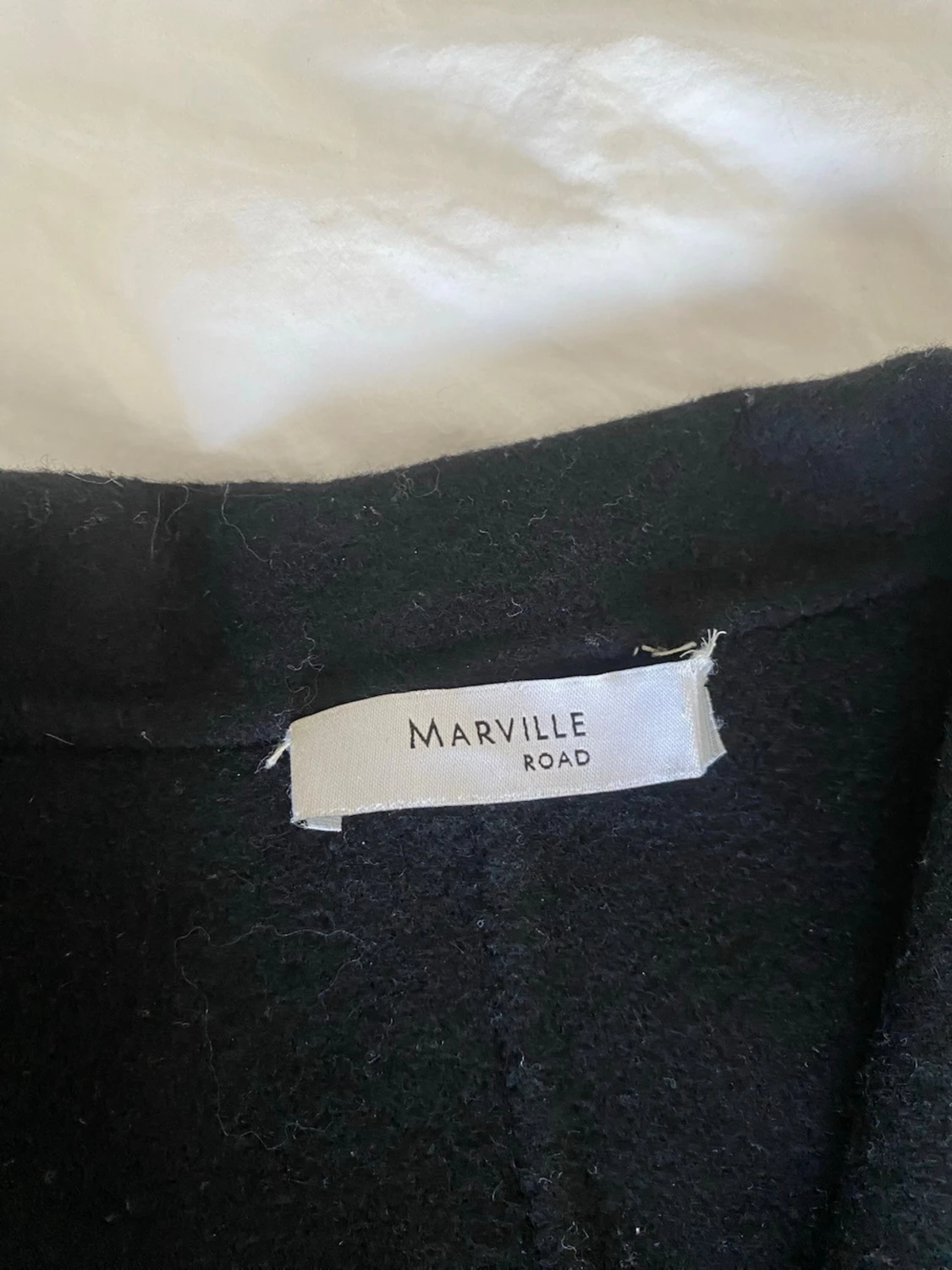 Svart ullkappa från Marville Road - 1