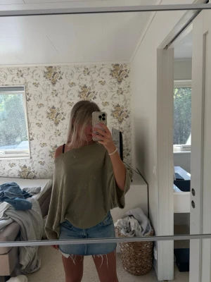 Poncho topp - Poncho topp från Nelly, helt ny med prislapp kvar