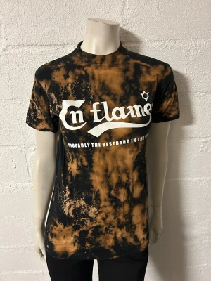 In flames T-shirt XS - Helt ny T-shirt In flames. Storlek XS. Med infärgade melerade blekningar.
