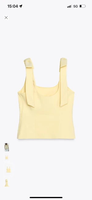 Gul topp från Zara - Hej,jag säljer nu min jättefina gula topp från Zara med rosetter på axlarna då den ej passa när jag fick hem den,hör av er vid intresse eller om du har några frågor!