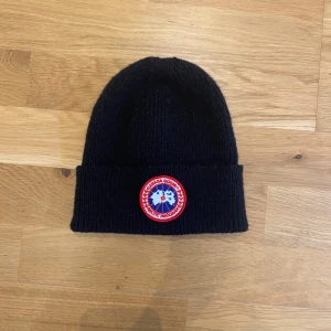 Canada goose beanie - Black Canada Goose beanie. Perfect for winter. Unworn.
