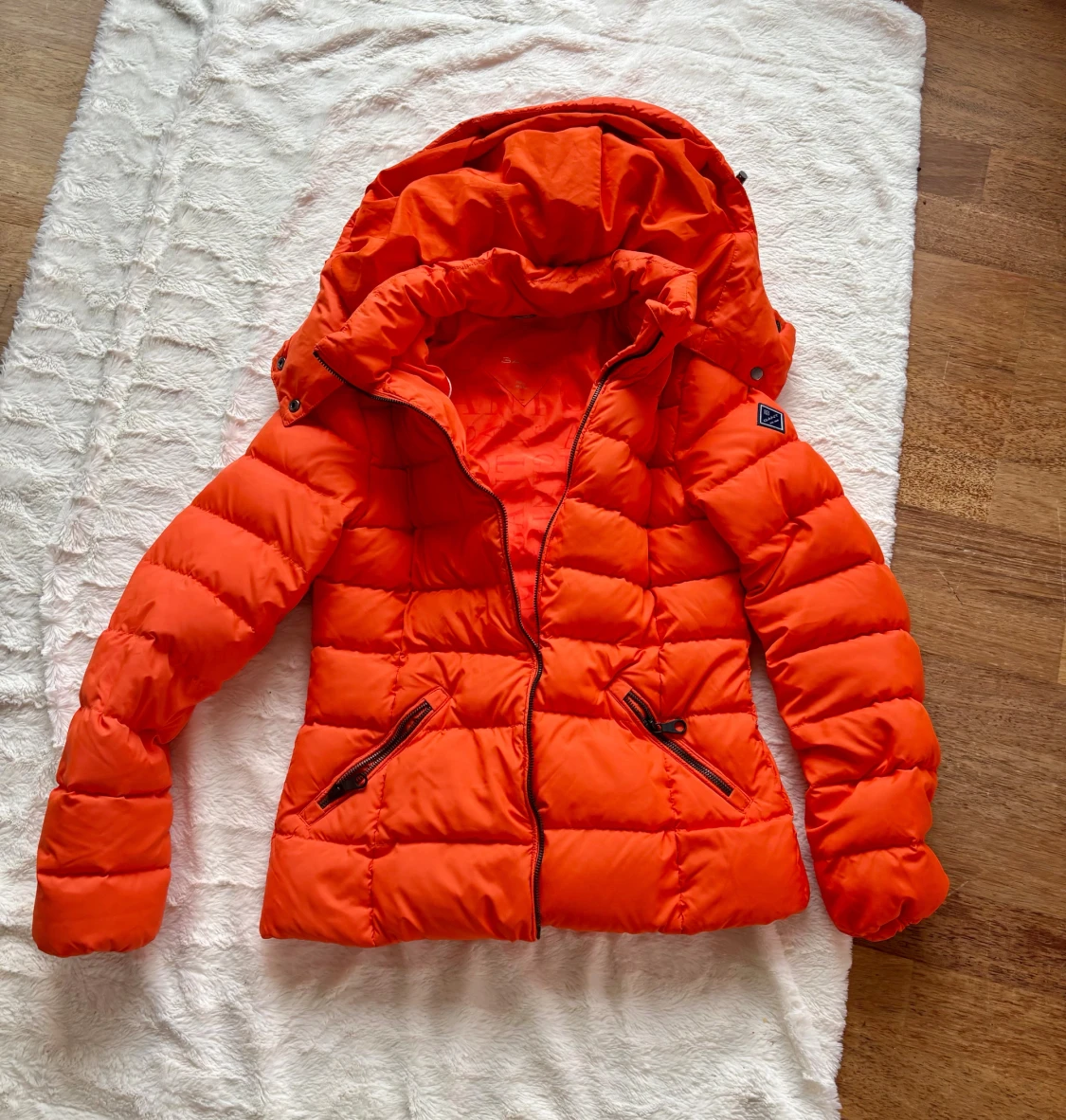 Orange pufferjacka från GANT