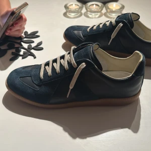 Masion Margiela gats 100% RIKTIGA Kvitto finns - Få på denna app som är riktiga, här är ett par! Storlek 42 men passar även 43. Har använt de 2 gånger och köpte de från sicuro. Har kvitto!