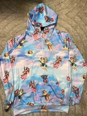 Tröja med änglar  - Storlek m