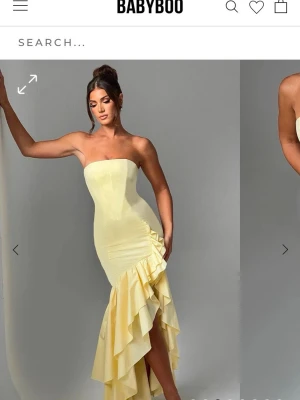 Ljusgul långklänning från Babyboo - Intressekoll på min ljusgula balklänning med axelbandslös design och figurnära passform. Endast använd en gång på balen! 