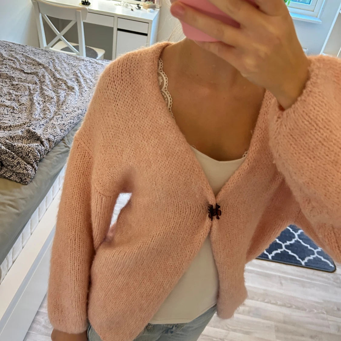 Ljusrosa stickad kofta från Lindex