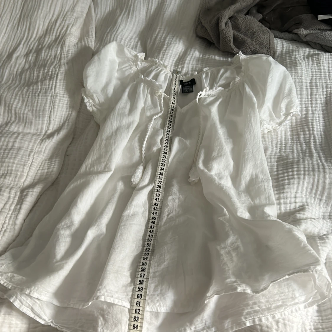 Jätte fin blus från ellos i storlek S men passar till l och m med  - 3