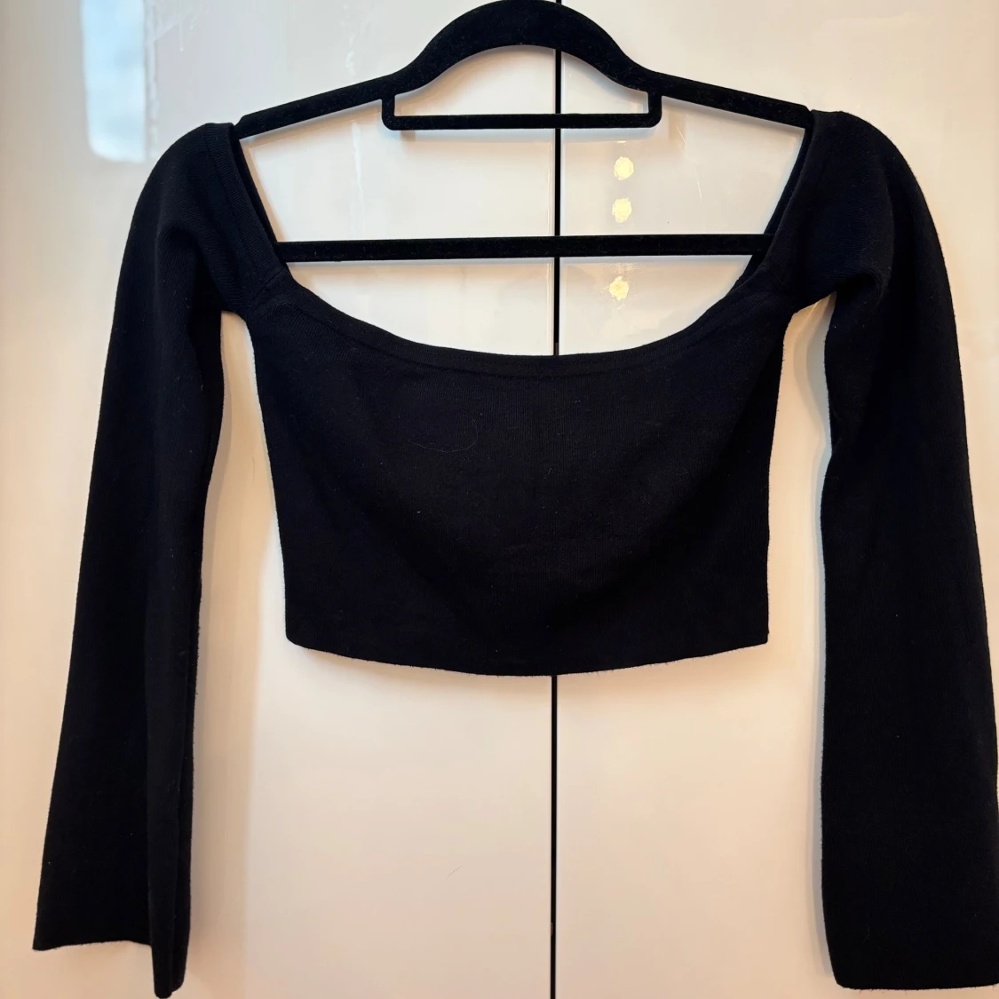 Tre långärmade toppar