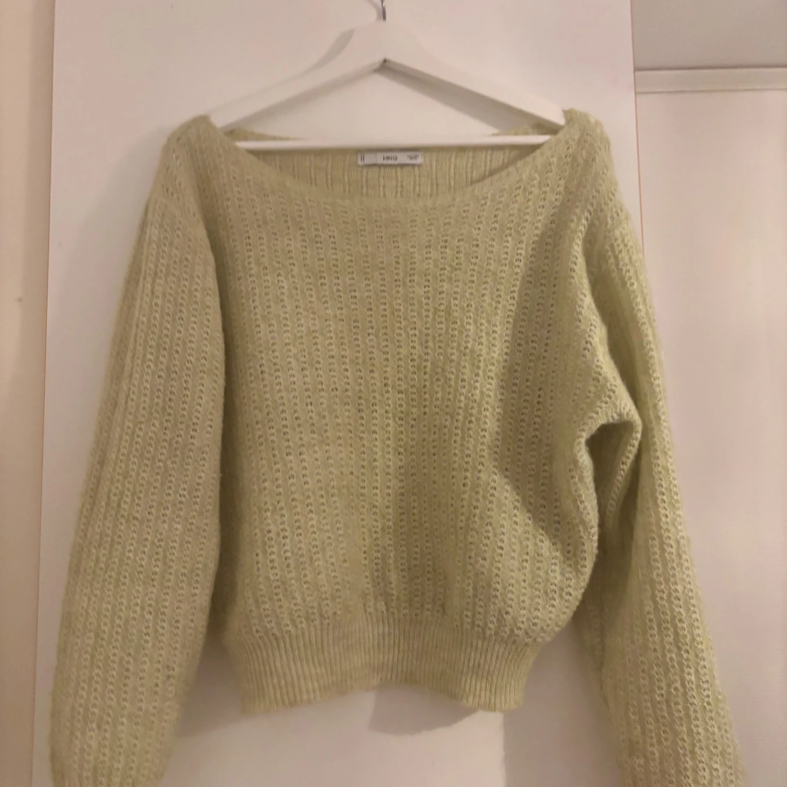 Ljusgrön stickad tröja