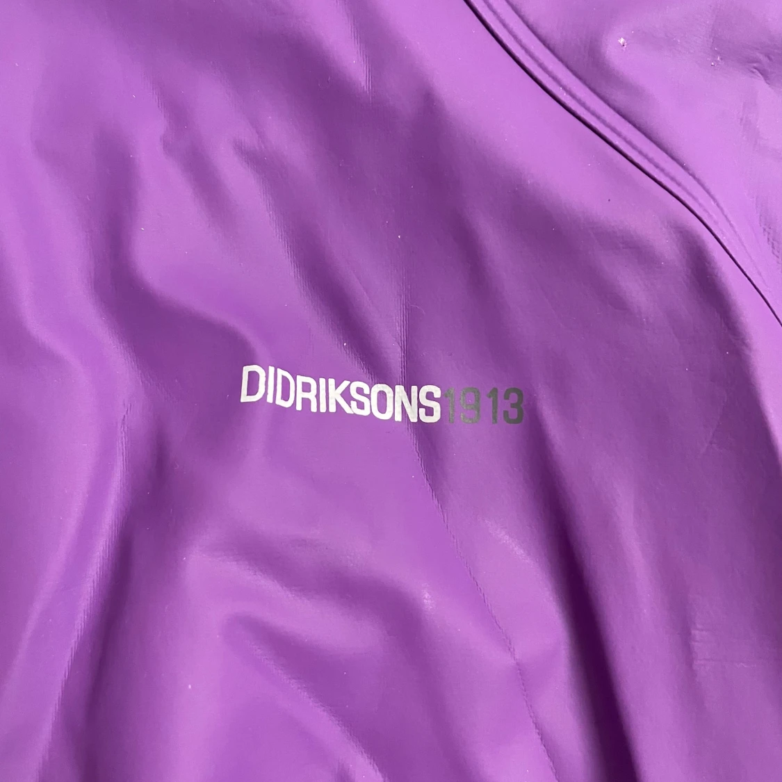 Lila regnjacka från Didriksons - 2
