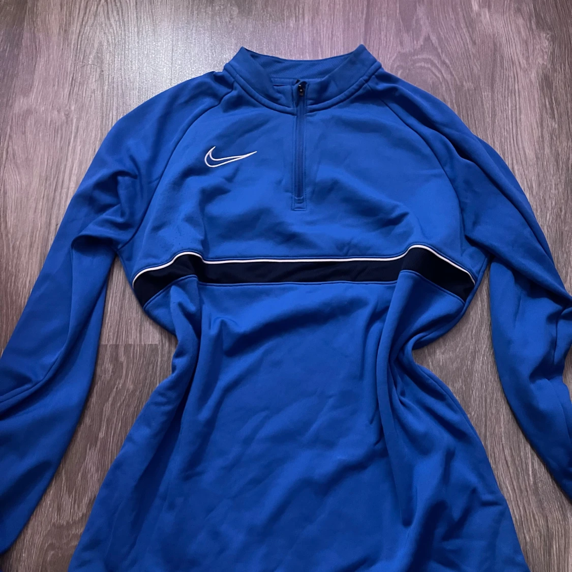 Blå Nike half zip tröja